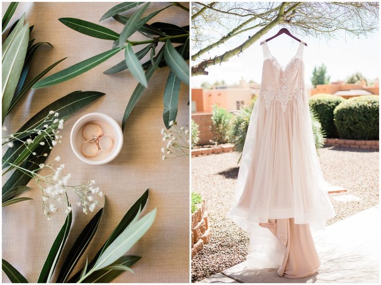 Wedding rings displayed in white cup with greenery. Brides dress at Tubac Wedding resort.