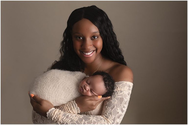 Newborn boy with mom in cream wrap and cream background. Studio in Sierra Vista, Arizona.